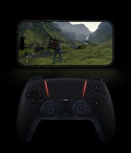 Gaming smartphone paired with a PlayStation controller playing an open-world game