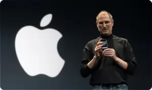 Steve Jobs presenting the original Apple iPhone on stage during keynote event